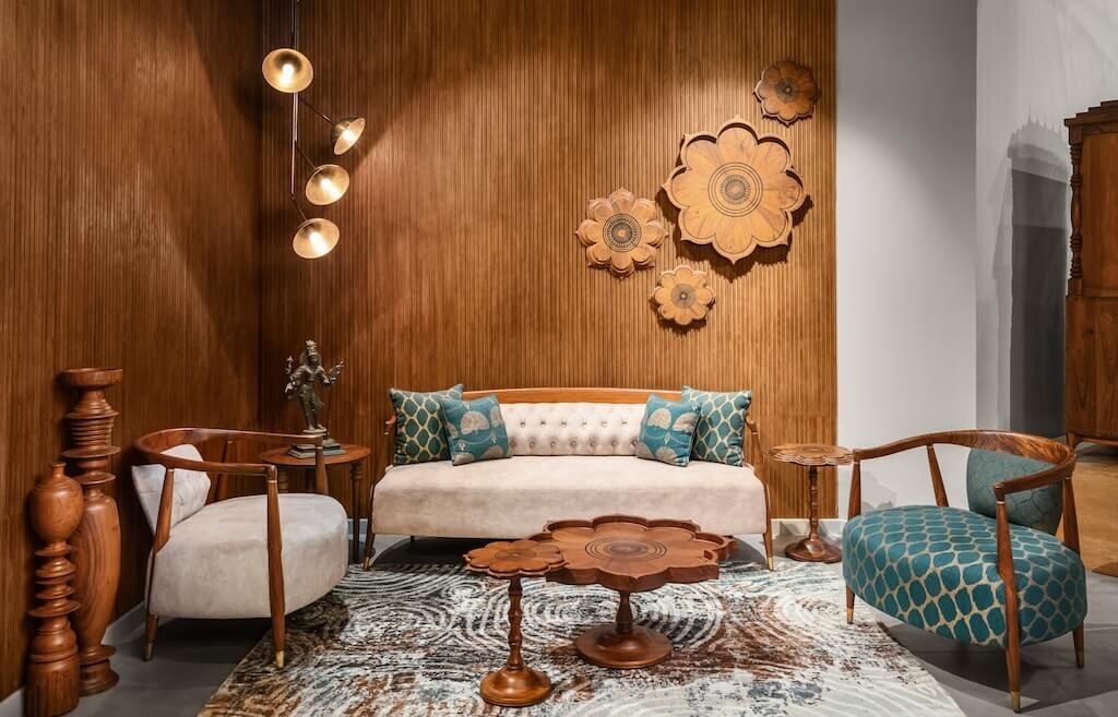 Seating corner with a fluted timber wall and carved lotus medallions